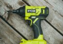 green and black cordless hand drill